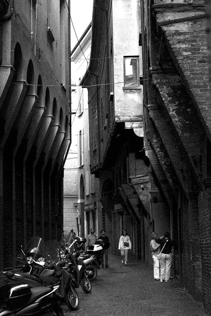 Bologna narrow street late afternoon