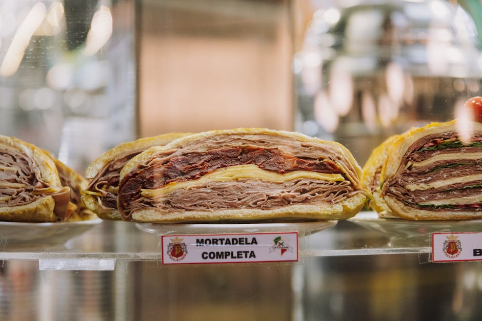 Mercato di Mezzo charcuterie stall mortadella slice