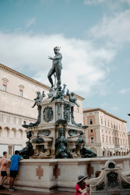 Piazza Maggiore Neptune fountain bright day