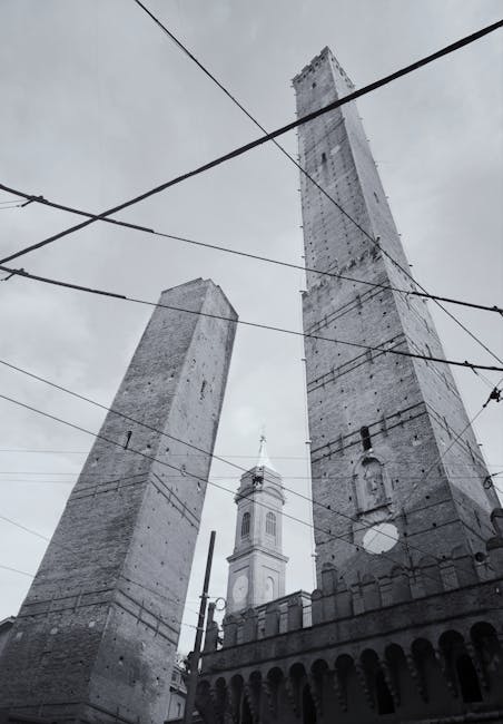 Two Towers Bologna afternoon light narrow street
