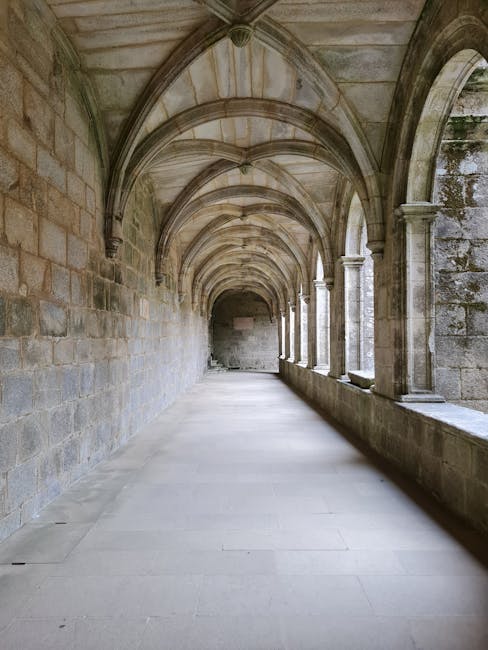 Ancient stone corridor cloister shadow play