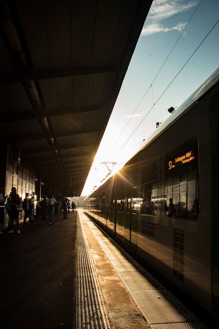 Parma train station platform morning commuters