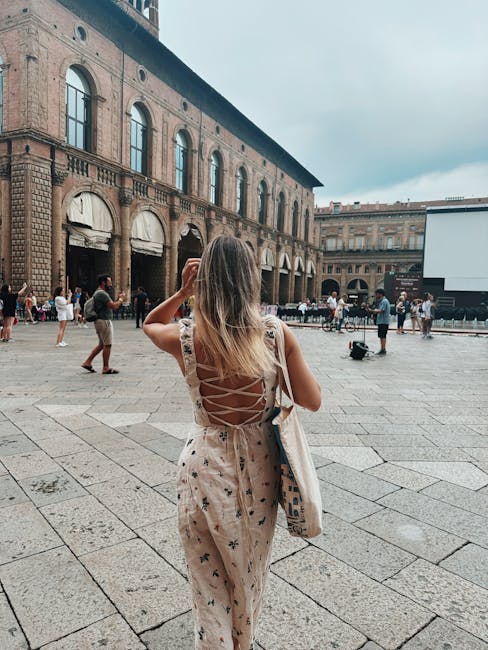 Piazza Maggiore crowd sunset Bologna